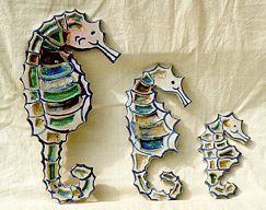 inlaid glass seahorses